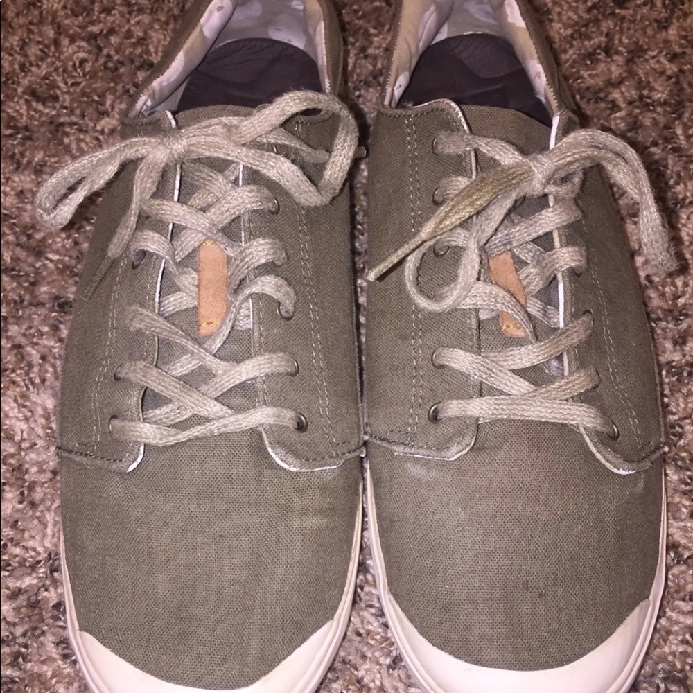 Green low top sneakers